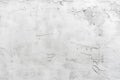Featuring a white concrete wall texture background, light gray cement surface with rough grainy stains, blank space for design or Royalty Free Stock Photo