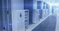 Featuring white server cabinets with breaker panels and black perforated racks in data center hall Royalty Free Stock Photo