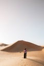Tourist couple and desert sand dune of Dubai - Abu Dhabi