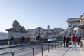 Feb 8, 2020 - Budapest, Hungary: Tourists on Szechenyi chain bridge with view of Buda Castle in far end Royalty Free Stock Photo