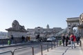 Feb 8, 2020 - Budapest, Hungary: Tourists on Szechenyi chain bridge with view of Buda Castle in far end Royalty Free Stock Photo