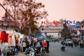 Busy evening with motorcycle traffic at night market in Dalat city - Vietnam