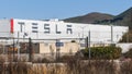 Feb 17, 2020 Fremont / CA / USA - Exterior view of Tesla Factory located in East San Francisco bay area; Large Tesla logo