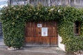 Feb 6, 2020 - Hallstatt, Austria: Interdiction of Drone sign and keep quiet sign on garage door in village Hallstatt