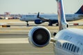 FEB 14, 2019 JFK NEW YORK, USA: jet engine against a plane at the airport on loading Royalty Free Stock Photo