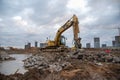 Excavator CATERPILLAR 324DL with crusher bucket MB BF80.3 S4 for crushing concrete at construction