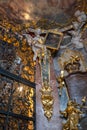 Feb 2, 2020 - Munich, Germany: Angel on ceiling holding a painting in entrance of Asamkirche baroque church in Munchen Royalty Free Stock Photo