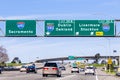 Feb 17, 2020 Pleasanton / CA / USA - Freeway interchange in East San Francisco Bay Area; Signs towards Sacramento, Oakland,