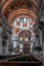 Feb 4, 2020 - Salzburg, Austria: View of nave pew and altar unde Royalty Free Stock Photo