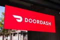 Feb 27, 2020 Santa Clara / CA / USA - Close up of Doordash logo and symbol displayed at the entrance to one of their offices;