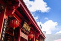 Songkhla, TAHILAND - Old vintage red building facade of Songkhla city pillar shrine with Chinese lanterns at Nang