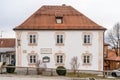 Feb 1, 2020 -- Steingaden, Germany: Side facade of traditional rococo restaurant with name Gasthof Schweiger on the wall