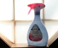 Febreze Air Freshener bottle in window sill Royalty Free Stock Photo