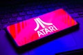 February 8, 2023, Brazil. In this photo illustration, the Atari logo is displayed on a smartphone screen Royalty Free Stock Photo