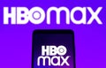 February 3, 2022, Brazil. In this photo illustration, the HBO Max logo is displayed on a smartphone screen and in the background Royalty Free Stock Photo