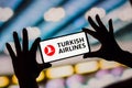 February 6, 2023, Brazil. In this photo illustration, the Turkish Airlines logo is displayed on a smartphone screen