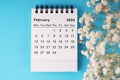 February 2024 Calendar flat lay blue background