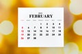 The 2023 February calendar is the month for the organizer to plan 2023 year on blurred bokeh background