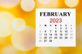 The 2023 February calendar is the month for the organizer to plan 2023 year on blurred bokeh background