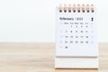 February calendar 2022 on wooden table