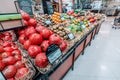 Ripe Pomegranate from Israel with a price tag in dirhams is sold in a supermarket in Dubai Royalty Free Stock Photo