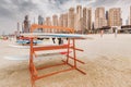 Stand with surf and sup boards for rent and swimming in the sea at JBR Beach in Dubai. Watersports