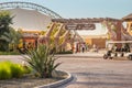 Visitors and tourists with families and children enter the gates of the Explorer Village at Dubai