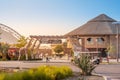 Visitors and tourists with families and children enter the gates of the Explorer Village at Dubai