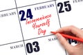 February 24. Hand writing text Inconvenience Yourself Day on calendar date. Save the date.