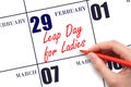 February 29. Hand writing text Leap Day for Ladies on calendar date. Save the date. Royalty Free Stock Photo