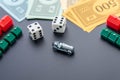 February 8, 2015: Houston, TX, USA. Monopoly car, dice, money, Royalty Free Stock Photo