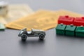 February 8, 2015: Houston, TX, USA. Monopoly car, dice, money,