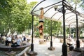 14 of February 2020, Kiev, Tarasa Shevschenka square. Girl hanging by feet upside down in the park and reading book