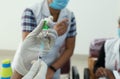 February 20, 2021, Kishanganj, Bihar, India. A nursing staff drawing covishield vaccine in a syringe preparing for Royalty Free Stock Photo