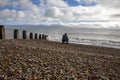 February 1, 2022. Landscape by the sea. The man is taking pictures on the seashore. Eastbourne East Sussex England Royalty Free Stock Photo