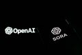 Openai Sora logo is displayed on a smartphone screen. OpenAI announced Sora artificial intelligence, which transforms