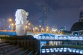 25 February 2018 Merlion statue fountain in Merlion Park at night time with cityscape of singapore in background.Merlion is a Royalty Free Stock Photo