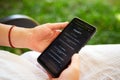 February 5, 2023, Mirissa, Sri Lanka. Using OpenAI chatGPT on phone. Woman chats with artificial intelligence. Person