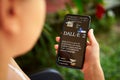 February 5, 2023, Mirissa, Sri Lanka. Using OpenAI DALL-E on phone. Woman testing artificial intelligence image