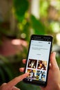 February 5, 2023, Mirissa, Sri Lanka. Using OpenAI DALL-E on phone. Woman testing artificial intelligence image