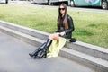 Model wears a pair of black leather boots and a yellow skirt during the Armani fashion show at the women`s fashion week fall / win Royalty Free Stock Photo