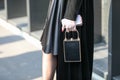 Model wears a very small black handbag during the Gucci fashion show at the women`s fashion week 2020 in Milan