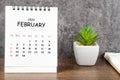 The February 2023 Monthly desk calendar for 2023 with diary on wooden table Royalty Free Stock Photo