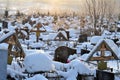 Crosses in a cemetery, monuments of the dead, a cemetery in winter, wreaths, artificial flowers. Russia Royalty Free Stock Photo