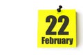 February 22nd. Day 22 of month, Calendar date. Yellow sheet of the calendar. Winter month, day of the year concept