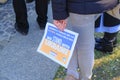 February 2022 Parma, Italy: Stand with Ukraine poster in hands of the person close-up. Demonstration against war. People supportin