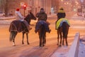 Three riders on horseback at the crossroads Royalty Free Stock Photo