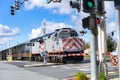 February 10, 2019 Sunnyvale / CA / USA - Caltrain crossing at a street junction near a residential neighborhood in south San Royalty Free Stock Photo