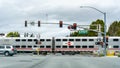 February 25, 2019 Sunnyvale / CA / USA - Caltrain crossing at a street junction near a residential neighborhood in south San Royalty Free Stock Photo