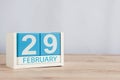 February 29th. Cube calendar for february 29 on wooden surface with empty space For text. Leap year, intercalary day Royalty Free Stock Photo